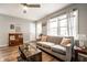 Comfortable living room with wood-look floors, stylish decor, and plenty of natural light at 1431 N Bolton Ave, Indianapolis, IN 46219