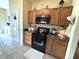 Functional kitchen with ample cabinetry, modern appliances, and a clean, organized layout at 160 Rambling Rd, Greenfield, IN 46140