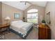 Comfortable bedroom with natural light, dresser, and a nautical theme at 1701 Summerwood Blvd, Greenfield, IN 46140