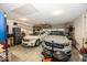 Spacious three car garage with storage and well lit with overhead lighting at 1701 Summerwood Blvd, Greenfield, IN 46140