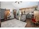 Inviting living room with hardwood floors, a sliding barn door, and an open view to the kitchen at 1701 Summerwood Blvd, Greenfield, IN 46140