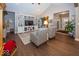 Open-concept living room featuring hardwood floors and a cozy seating area at 1701 Summerwood Blvd, Greenfield, IN 46140
