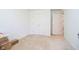 This bedroom features neutral carpet, white walls, and closet doors at 194 Waterford Ct, Avon, IN 46123