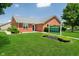 Brick clubhouse features a manicured lawn with professional landscaping at 194 Waterford Ct, Avon, IN 46123