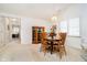 Elegant dining area with classic wood furniture and a view into the living spaces at 194 Waterford Ct, Avon, IN 46123