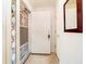 Bright entry foyer with tile flooring, decorative door and a view into the house at 194 Waterford Ct, Avon, IN 46123