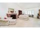 Inviting living room with vaulted ceiling, fireplace, and large windows for natural light at 194 Waterford Ct, Avon, IN 46123
