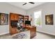 Dedicated home office space with built-in shelving, desk, and ample natural light at 20010 Prescott Pl, Westfield, IN 46074