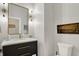 Stylish powder room features a modern vanity, decorative lighting, and a sleek design at 20010 Prescott Pl, Westfield, IN 46074