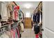 Large walk-in closet with custom shelving and plenty of room for storage and organization at 20010 Prescott Pl, Westfield, IN 46074