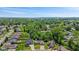 Aerial view of a residential neighborhood with mature trees and spacious lots at 205 Canaan Ct, Mooresville, IN 46158