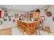 Finished basement bar with light-wood bar and stools, and plenty of décor at 205 Canaan Ct, Mooresville, IN 46158