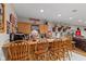 Finished basement bar with light-wood bar and stools, décor, and overhead lighting at 205 Canaan Ct, Mooresville, IN 46158