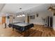 Finished basement featuring a billiards table, exercise equipment and unique decor throughout at 205 Canaan Ct, Mooresville, IN 46158