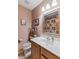 Inviting bathroom with pink walls, a patterned shower curtain, and decorative accents at 205 Canaan Ct, Mooresville, IN 46158