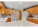 Functional kitchen featuring ample countertop space, white cabinets, and modern appliances at 205 Canaan Ct, Mooresville, IN 46158