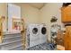 Convenient laundry room equipped with modern washer and dryer at 205 Canaan Ct, Mooresville, IN 46158