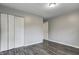 Bright bedroom with wood floors, closet, and neutral paint, offering a serene atmosphere at 2228 Dover St, Anderson, IN 46013