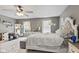 Bright bedroom features a king bed, neutral decor, and ample natural light at 2249 Blossom Dr, Greenwood, IN 46143