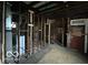Interior shot of room under construction with partial flooring and equipment at 226 Miley Ave, Indianapolis, IN 46222