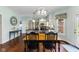 Eat-in kitchen features a wood table with seating for four, stainless steel appliances, and adjacent countertops at 248 Runyon Ct, Greenwood, IN 46142