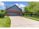 Spacious garage with a private driveway and additional storage space available at 248 Runyon Ct, Greenwood, IN 46142