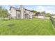 Spacious backyard with a large shed and lush green grass at 2802 Singletree Dr, Indianapolis, IN 46234