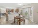 Inviting dining area with access to the backyard and an open connection to the adjacent kitchen at 2802 Singletree Dr, Indianapolis, IN 46234