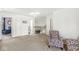 Upstairs landing area with neutral walls, decorative accents, and access to bedrooms at 2802 Singletree Dr, Indianapolis, IN 46234