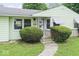 Inviting front entrance with stone accents and well-maintained shrubbery at 2840 W 12Th St, Anderson, IN 46011