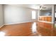 Open-concept living room features wood floors, neutral paint and built in storage at 3059 Black Forest Ln, Indianapolis, IN 46239