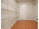 Walk-in pantry with white wire shelving provides ample storage space at 3059 Black Forest Ln, Indianapolis, IN 46239