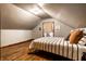 Inviting bedroom with hardwood floors, neutral walls, and stylish décor at 309 N Riley Ave, Indianapolis, IN 46201