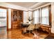 Charming dining room with hardwood floors, built-in cabinet, and natural light at 309 N Riley Ave, Indianapolis, IN 46201