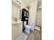 Compact bathroom featuring white vanity and shower at 3414 Rost Dr, Columbus, IN 47203