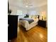 Bedroom with hardwood floors, ceiling fan and closet at 3414 Rost Dr, Columbus, IN 47203