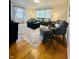 Comfortable living room area with wood floors, area rug, and neutral colors with modern furnishings at 3414 Rost Dr, Columbus, IN 47203