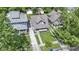 Aerial view of a well-maintained house with a manicured front yard and driveway at 344 N Whittier Pl, Indianapolis, IN 46219