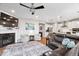 Spacious living room featuring a fireplace and seamless access to the kitchen and dining areas at 3463 Sunnyvale Dr, Brownsburg, IN 46112