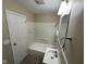 Clean bathroom featuring a bathtub, white tile, and a modern vanity at 3742 N Wittfield St, Indianapolis, IN 46235