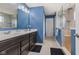 Bathroom featuring double sinks, granite countertops, and glass shower at 3948 Saddle Club S Pkwy, Bargersville, IN 46106