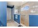Bright bathroom featuring a glass enclosed shower and window letting in lots of natural light at 3948 Saddle Club S Pkwy, Bargersville, IN 46106