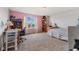Cozy bedroom featuring a bed, desk, and bright natural lighting at 3948 Saddle Club S Pkwy, Bargersville, IN 46106