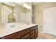 Well-lit bathroom featuring a double sink vanity with stone countertops and a separate shower with glass doors at 4367 Homestead Dr, Whitestown, IN 46075