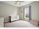 Bedroom featuring a white crib, natural light, and soft colors at 4367 Homestead Dr, Whitestown, IN 46075