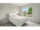 Bright bedroom with large window and neutral decor at 4367 Homestead Dr, Whitestown, IN 46075
