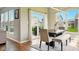 Open dining area with patio access and a bench for seating at 4367 Homestead Dr, Whitestown, IN 46075