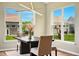 Bright dining room featuring modern lighting and views of the backyard at 4367 Homestead Dr, Whitestown, IN 46075