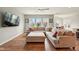 Comfortable living room with ample seating, TV, and backyard views at 4367 Homestead Dr, Whitestown, IN 46075