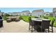 Outdoor patio with comfortable seating, a fire pit table, and a grill, perfect for entertaining at 4367 Homestead Dr, Whitestown, IN 46075